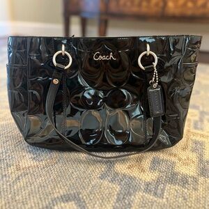 Coach embossed logo, black patent leather handbag